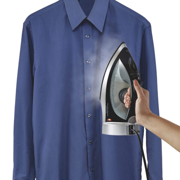 Ironing a blue shirt